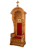 Трон с балдахином и иконой.